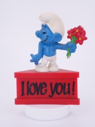 Schtroumpf amoureux avec fleurs