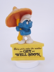 Schtroumpf avec parapluie champignon