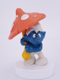 Schtroumpf avec parapluie champignon