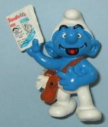 Schtroumpf avec journal