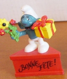 Schtroumpf avec cadeau et fleurs