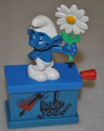 Schtroumpf courtisant avec fleur (rendez-vous)