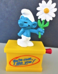 Schtroumpf courtisant avec fleur (rendez-vous)