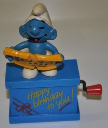 Schtroumpf chanteur avec partition