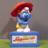 Schtroumpf avec parapluie champignon