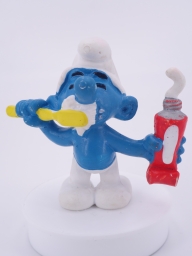 Schtroumpf avec brosse à dents et dentifrice