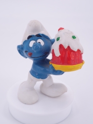 Schtroumpf gourmand avec gâteau