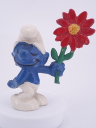 Schtroumpf courtisant avec fleur (rendez-vous)